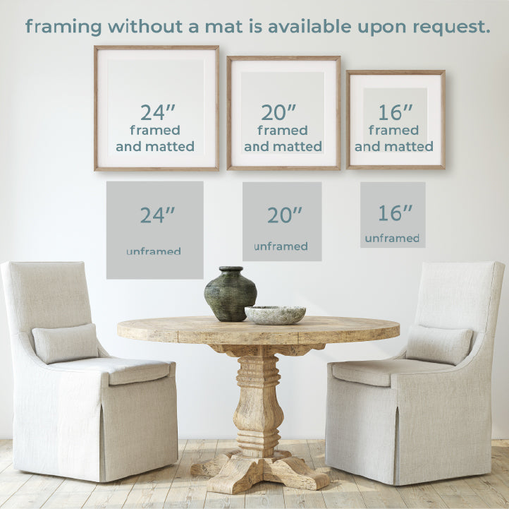 a table with two chairs and a vase on it