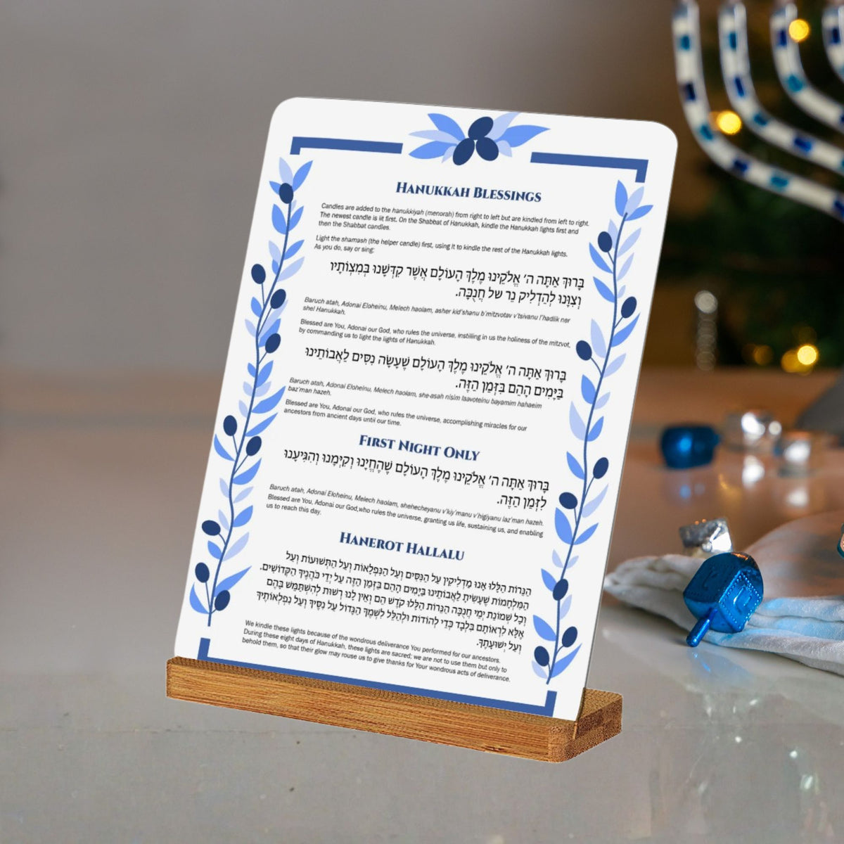 hanukkah blessings in stand on table
